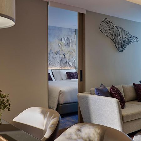 Chatrium Grand Bangkok Exterior photo A sliding door