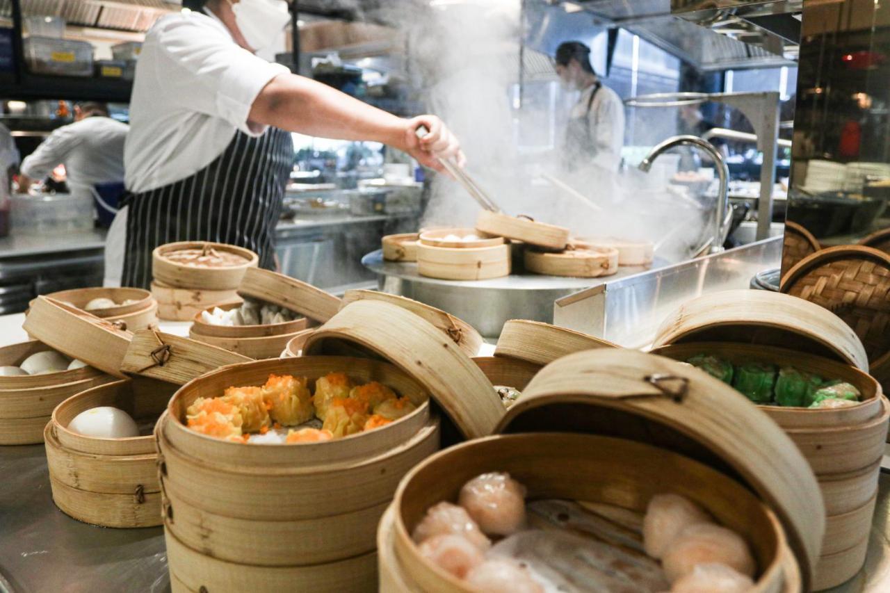 Chatrium Grand Bangkok Exterior photo Dim sum being prepared in a restaurant