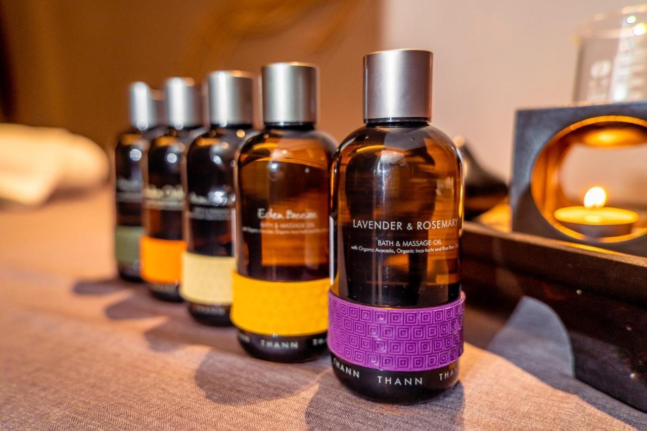 Chatrium Grand Bangkok Exterior photo Essential oil bottles