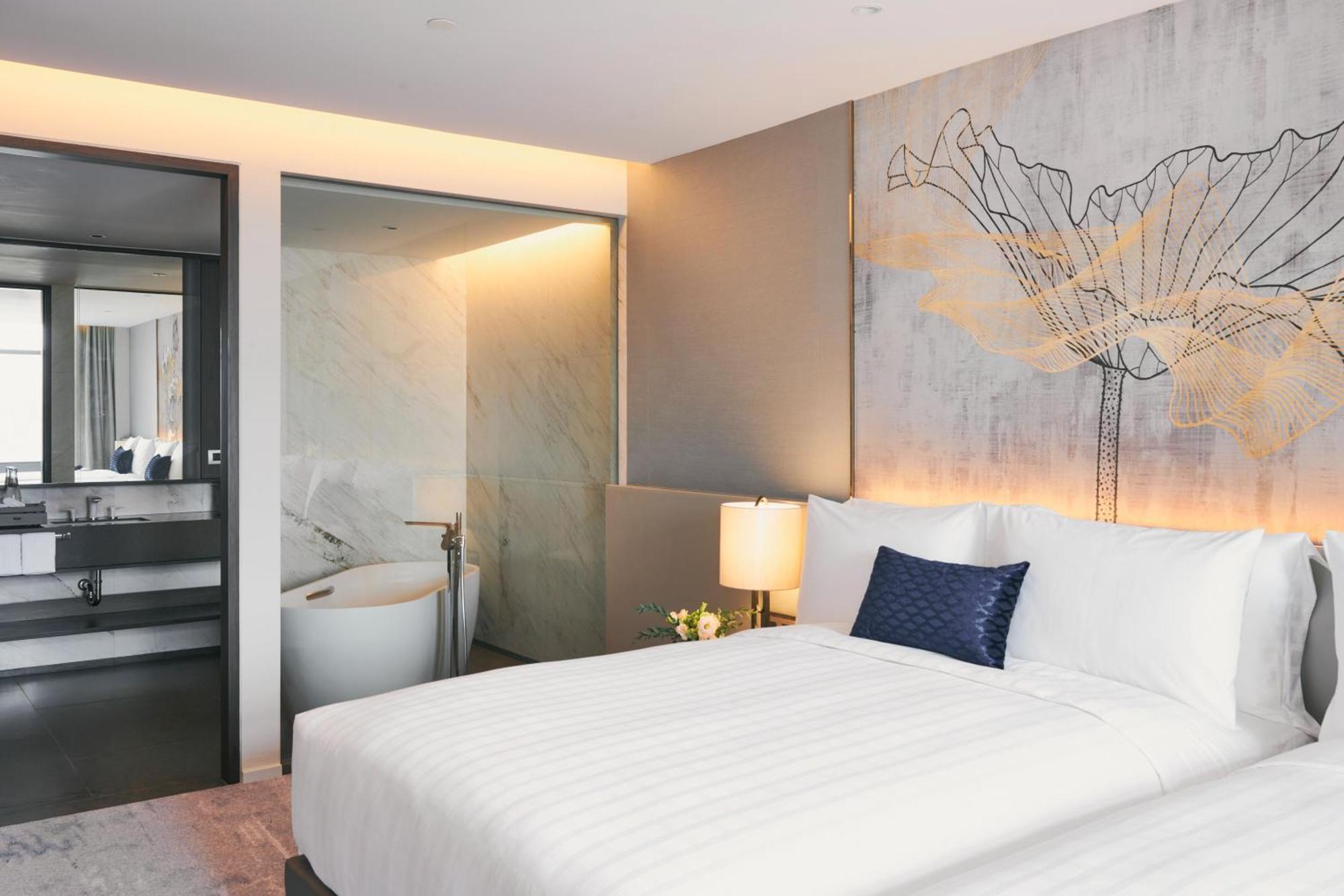 Chatrium Grand Bangkok Exterior photo Deluxe Room