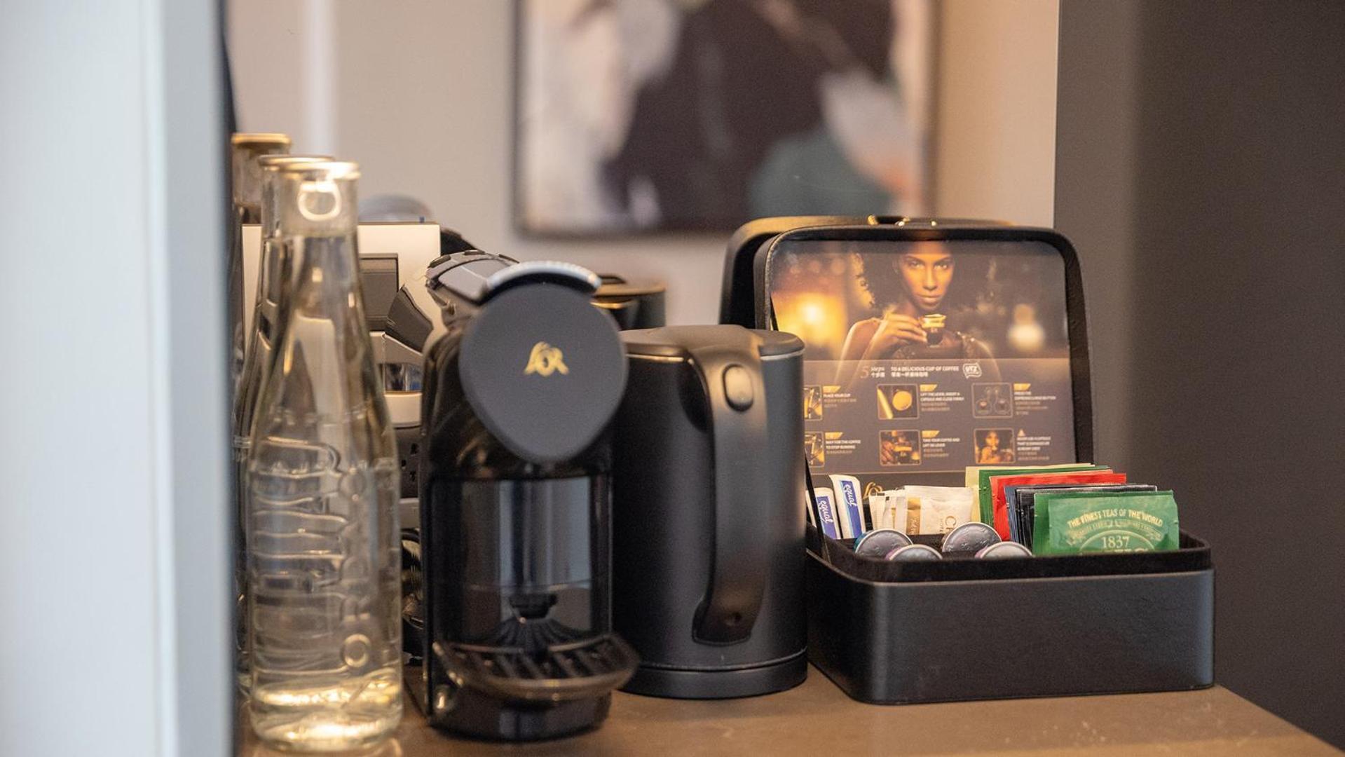 Chatrium Grand Bangkok Exterior photo A Nespresso coffee machine